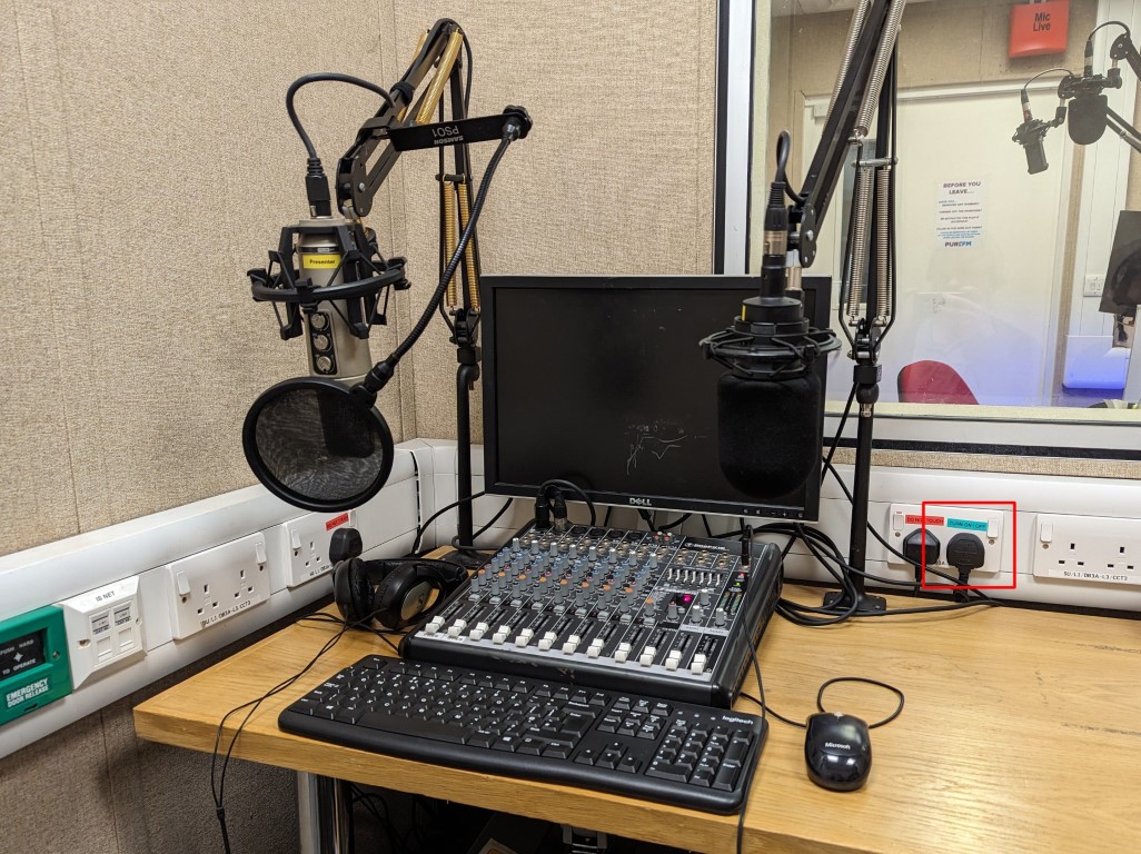 Studio 2 desk with plug for monitor highlighted